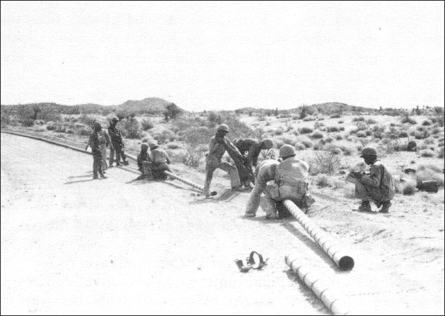 Laying pipe in the desert